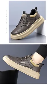 Detail view of men's retro thick-sole sneakers with textured leather and rib-knit collar