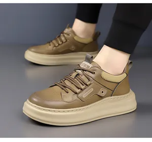 Detail of men's brown leather fashion sneaker with thick sole and stitching
