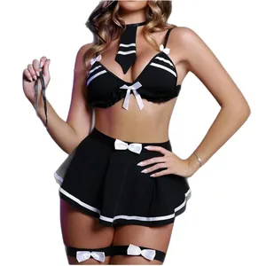 Ensemble lingerie soubrette noir et blanc avec haut court et mini-jupe plissée à nœuds