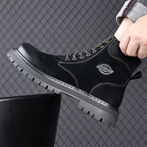 Retro black leather work boots for men featuring a thick non-slip sole and industrial design