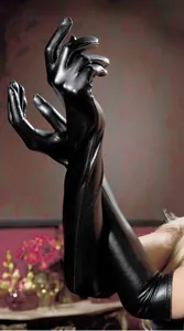 Close-up of long black shiny faux leather gloves over the elbow with glossy finish