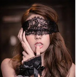 Erotic black floral lace eye mask and matching wrist cuffs set with satin bows