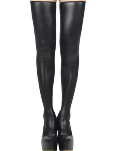 Detail of shiny faux leather thigh-high boots with high platform and stiletto heels