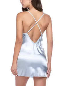 Detailed back view of a light blue satin chemise showing cross straps and open back design