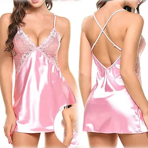 Pink satin slip dress with lace trim and criss-cross backless design for women