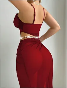 Detailed back view of a burgundy mesh sheer long dress set with golden chain belt decoration