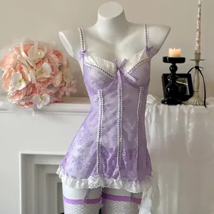 Elegant lavender lace lingerie set with floral patterns and matching garter belt straps