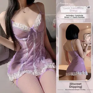 Detailed view of purple lace lingerie set with bow accent and white mesh ruffles