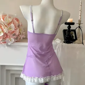 Detailed back view of light purple mesh nightgown with white floral lace trim on hem