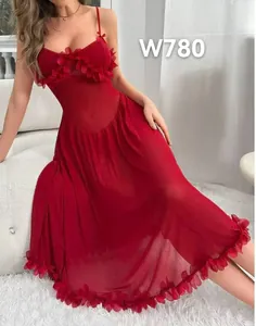 Detail of red mesh robe with delicate floral petals and sheer lace texture