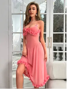 Detail of pink mesh slip dress with 3D floral appliqués and sheer lace fabric texture