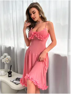 Detailed close-up of pink mesh sleepwear featuring 3D floral petal embellishments