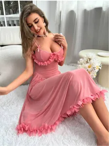 Detailed close-up of pink mesh nightgown featuring delicate 3D floral petals and silk bow
