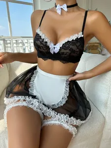 Detailed view of sexy lace maid lingerie set with white ruffles and satin bows