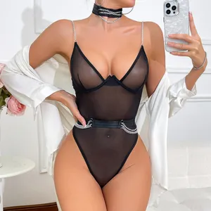 Close-up of black mesh sheer bodysuit featuring silver chain straps and waist detailing