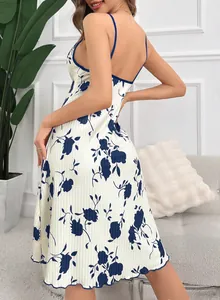 Detail view of ribbed fabric texture and blue floral print on backless strap sleepwear