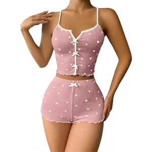 Pink heart print camisole pajamas set with bow details and ruffled trim hem