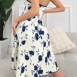 Floral print camisole sleepwear dress with ruched texture shown from a side view