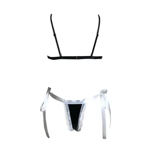Ensemble de lingerie en dentelle avec bustier noir et nœuds en satin blanc