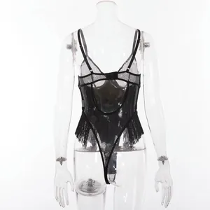 Detailed back view of mesh bodysuit featuring fringe accents and open back design