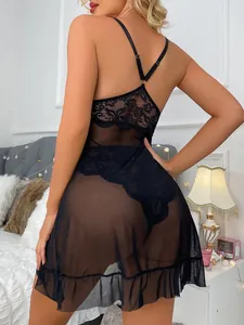 Detailed back view of sheer black lace lingerie dress with floral embroidery and mesh