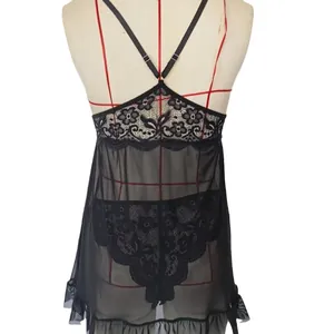 Sexy black lace lingerie set with sheer mesh and crisscross back straps on mannequin