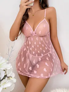Close-up of pink heart-patterned sheer mesh babydoll set with delicate thin straps