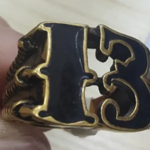 Vintage gold-plated stainless steel ring featuring lucky number 13 with black enamel