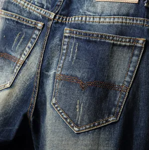 Men's retro slim fit distressed dark blue denim jeans with vintage washed finish