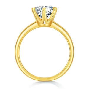 Elegant gold six-prong setting engagement ring featuring a round brilliant moissanite stone