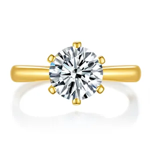 Classic six-prong S925 silver ring with large round moissanite in a gold finish