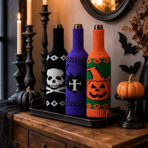 Three-piece knitted Halloween wine bottle covers with skull, pumpkin and bat patterns