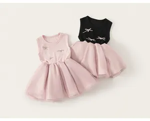 Detail view of toddler tulle dresses with knit tops, satin bows and heart crystals