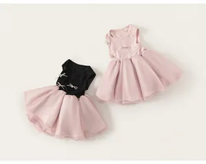 Detail of toddler sleeveless tulle dress featuring a bow knot and tiered mesh tutu skirt