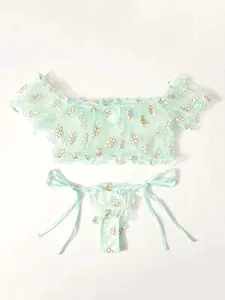 Detailed embroidery on mint green sheer mesh lingerie set with ruffled off-shoulder top