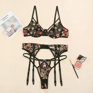 Three-piece black lace lingerie set with floral embroidery bra and garter belt