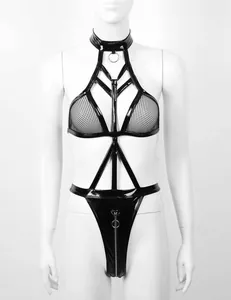 Detail of black patent leather lingerie set with mesh fabric and metal ring hardware