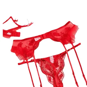 Three-piece red lace lingerie set featuring floral embroidery and mesh garter belt