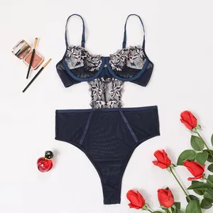 Navy blue lace bodysuit with floral embroidery and underwire support on white background