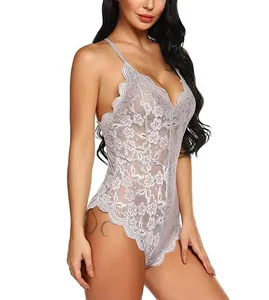Detailed close-up of lavender lace bodysuit featuring deep V-neck and scalloped edges