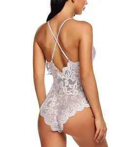 Close-up of sexy backless lace bodysuit with adjustable cross straps and floral texture