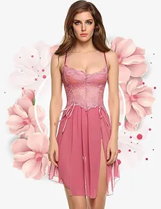 Detailed close-up of pink lace bodice with bow and sheer chiffon hemline on nightgown