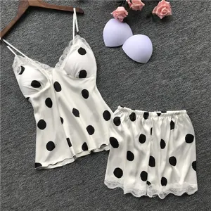 Cute polka dot satin lingerie set with lace trim camisole and shorts including breast pads