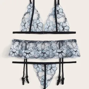Three-piece light blue floral embroidered mesh lingerie set with garter belt and thong