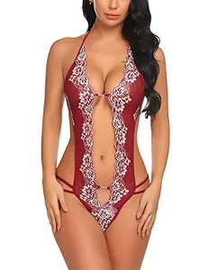 Macro view of dark red lace teddy lingerie with white lace trim and metal buckle detail