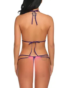 Deep purple halter lingerie set showing the minimalist back tie design on model