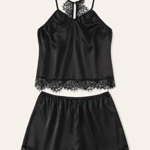 Two-piece black satin sleepwear set for women with eyelash lace trim and racerback detail