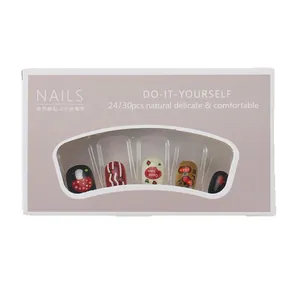 Süße kurze runde Press-on-Nägel Set mit rotem Pilz und Pop-Art-Design in Geschenkbox