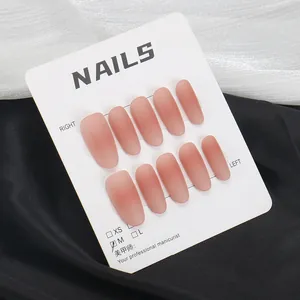 Matte nude pink gradient press-on nails set with 10 oval pieces on display card