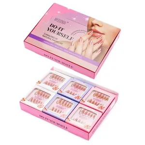 Macro view of MYSEVENDAY press-on nail kit featuring six elegant pink gradient styles
